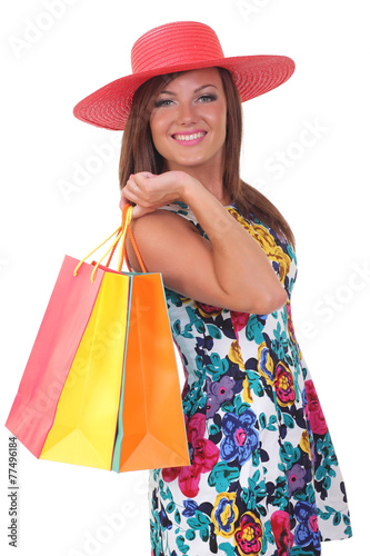 Portrait of young happy smiling woman with shopping bags