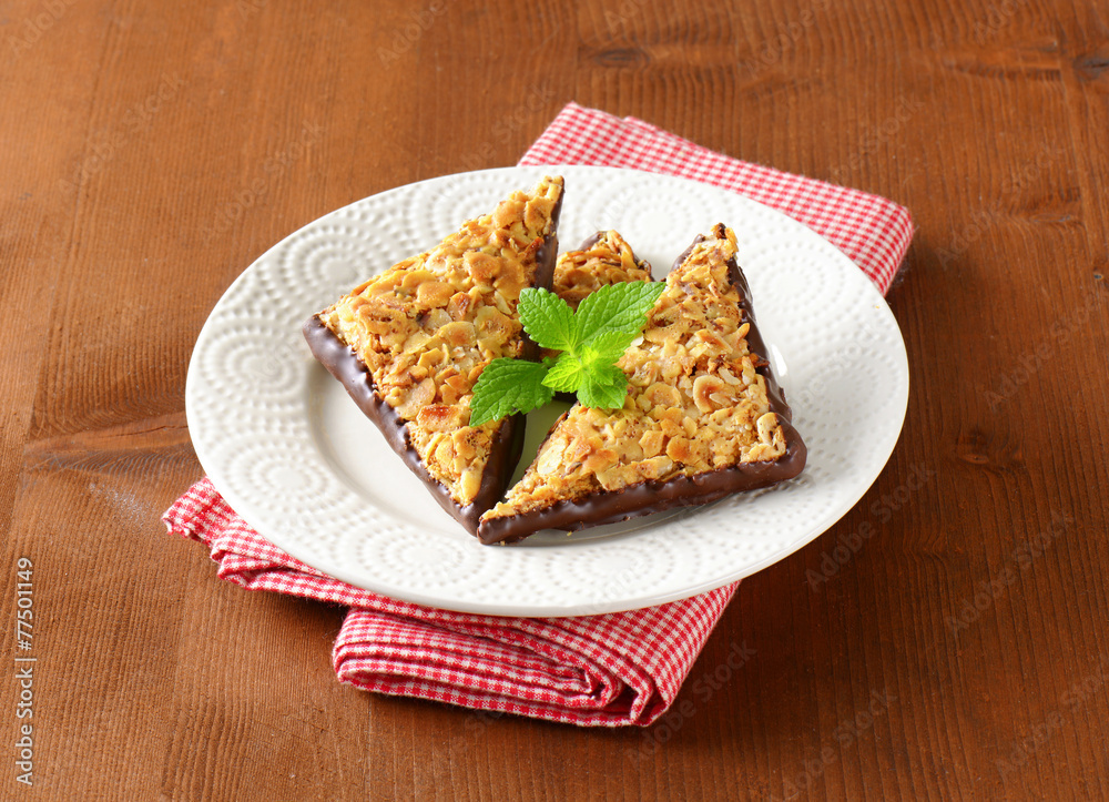 Triangle nut bars dipped in chocolate Triangle nut bars dipped in chocolate