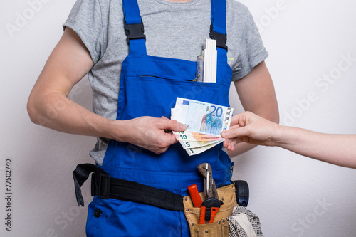 Naklejka Bauarbeiter mit Geld
