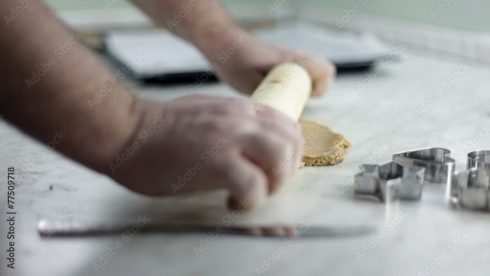 close up shot of man hands that are making dough for cookies close up shot of man hands that are making dough for cookies