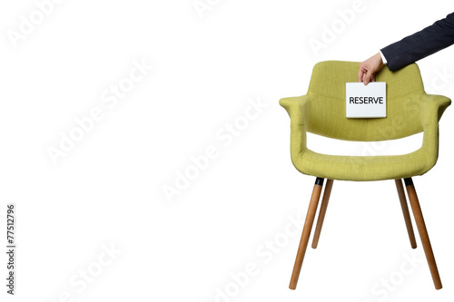 businessman hold paper note to reserve modern green armchair  wo