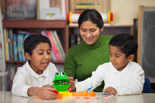 Hispanic Family Playing Mr. Frog