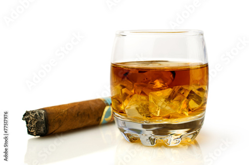 whiskey with ice cubes and  cigar