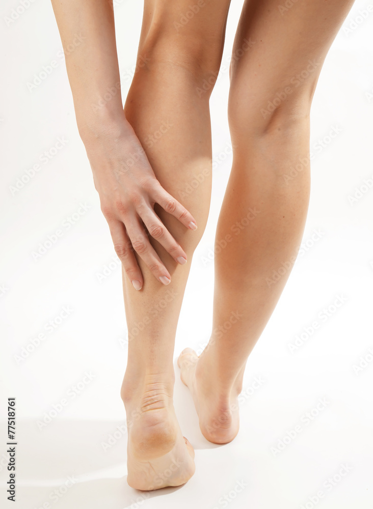 Beautiful fit long female legs, isolated on white Beautiful fit long female legs, isolated on white