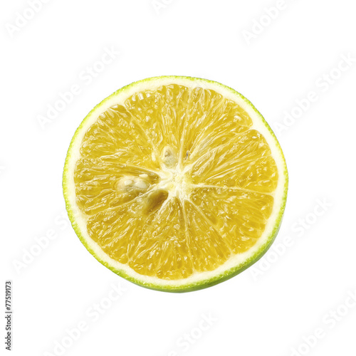 Single cross section of lemon. Isolated on white background