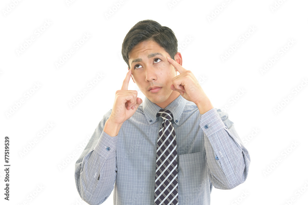 頭痛を訴えるビジネスマン