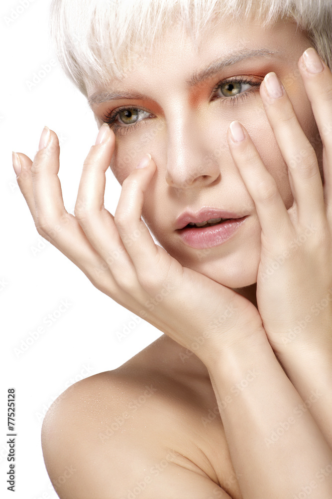 Beauty model blonde short hair showing perfect skin Beauty model blonde short hair showing perfect skin