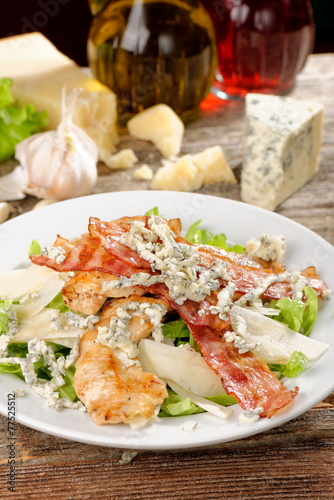 Bowl of Traditional Caesar Salad with Chicken and Bacon