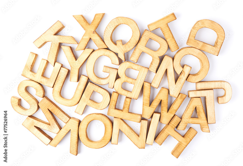 Surface covered with multiple wooden letters Surface covered with multiple wooden letters