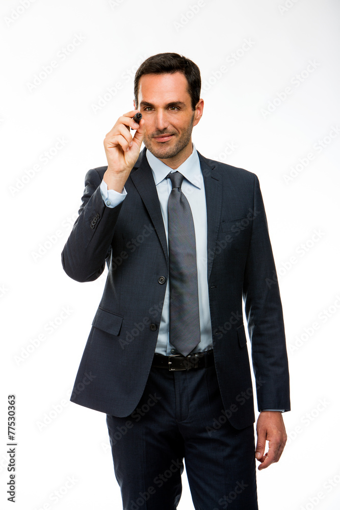 businessman with a black marker writing on the screen businessman with a black marker writing on the screen