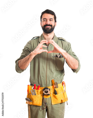 Mechanic making a heart with his hands