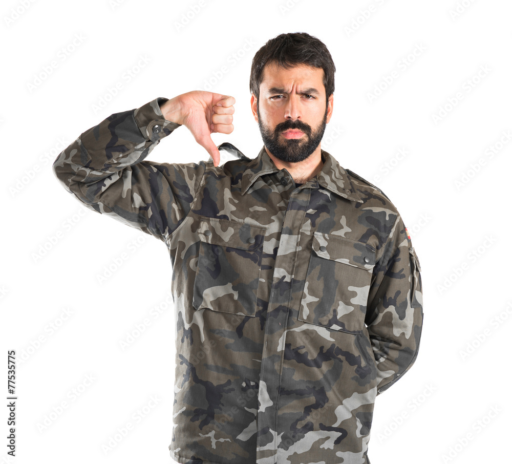 Soldier doing bad signal