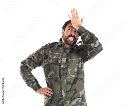 Soldier having doubts over white background