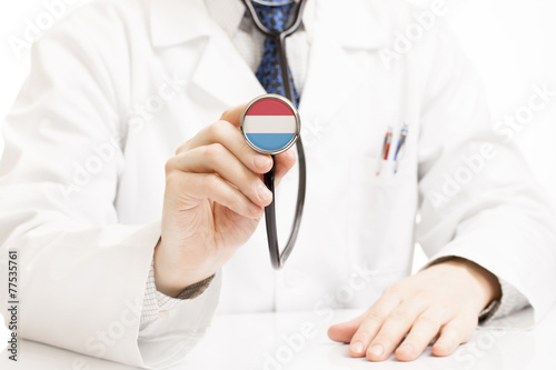 Doctor holding stethoscope with flag series - Luxembourg