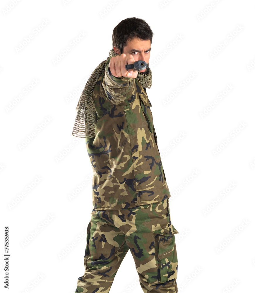 Soldier shooting a gun Soldier shooting a gun