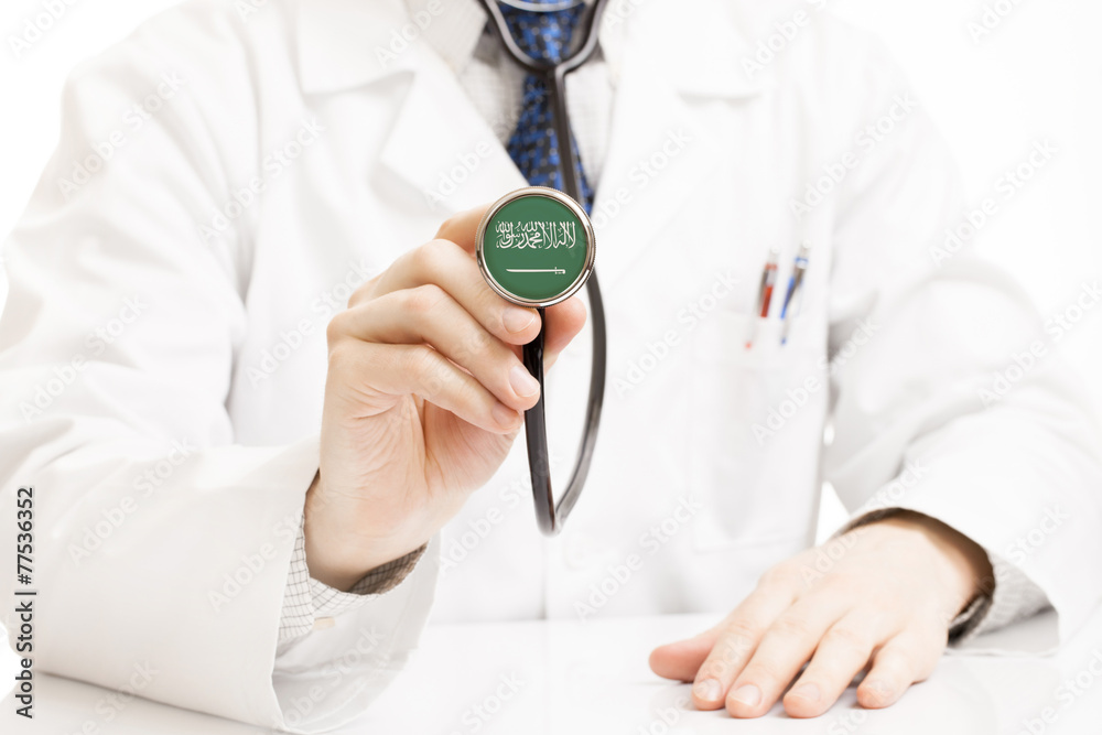 Doctor holding stethoscope with flag series - Saudi Arabia Doctor holding stethoscope with flag series - Saudi Arabia