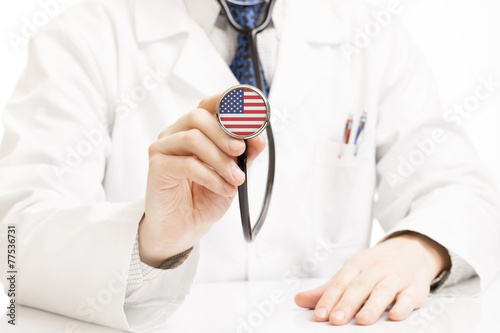 Doctor holding stethoscope with flag series - United States
