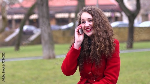 Girl fun talking on the phone laughing photo