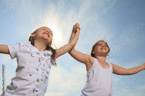 Two sister who having fun together outside