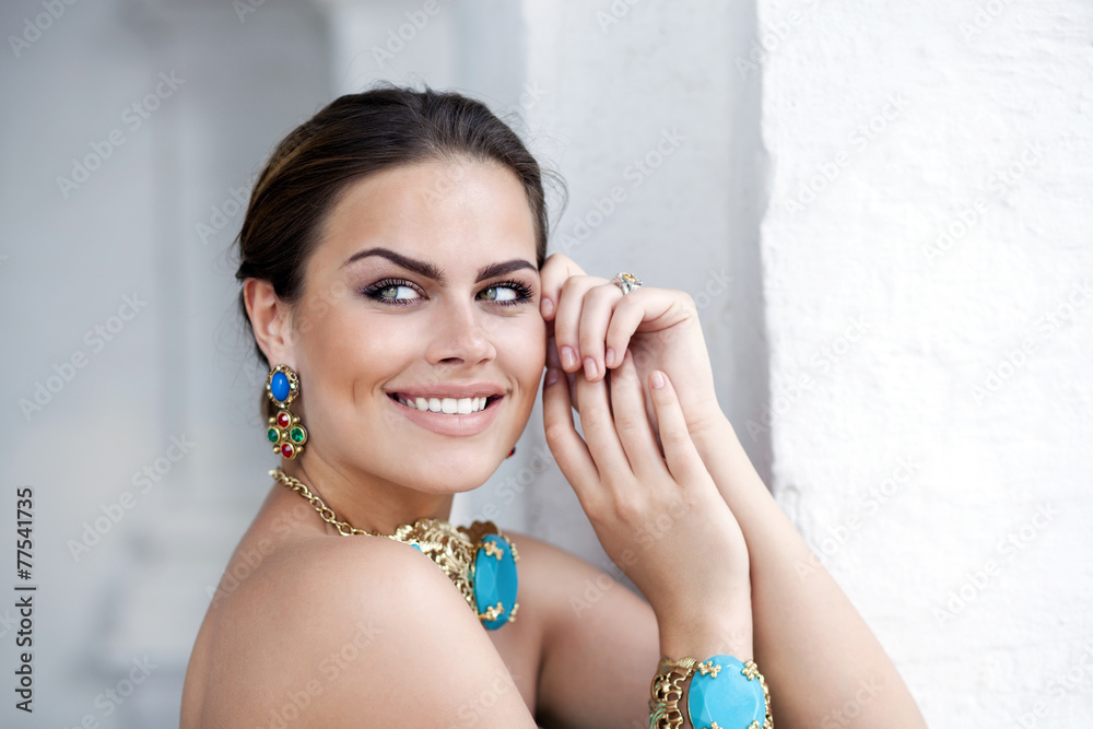 Young beautiful woman with jewelry