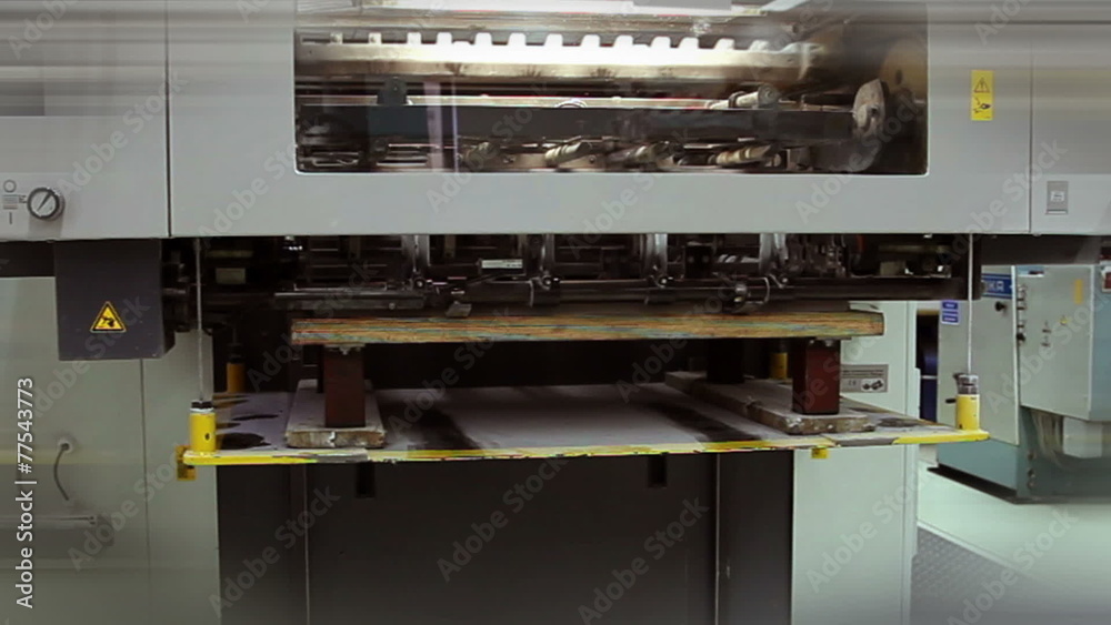 Zooming out working printer's machinery Zooming out working printer's machinery