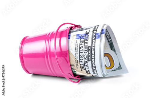 Money in a pink bucket