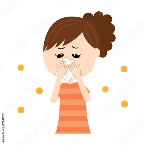 A young woman blowing nose, allergen flowing in the air