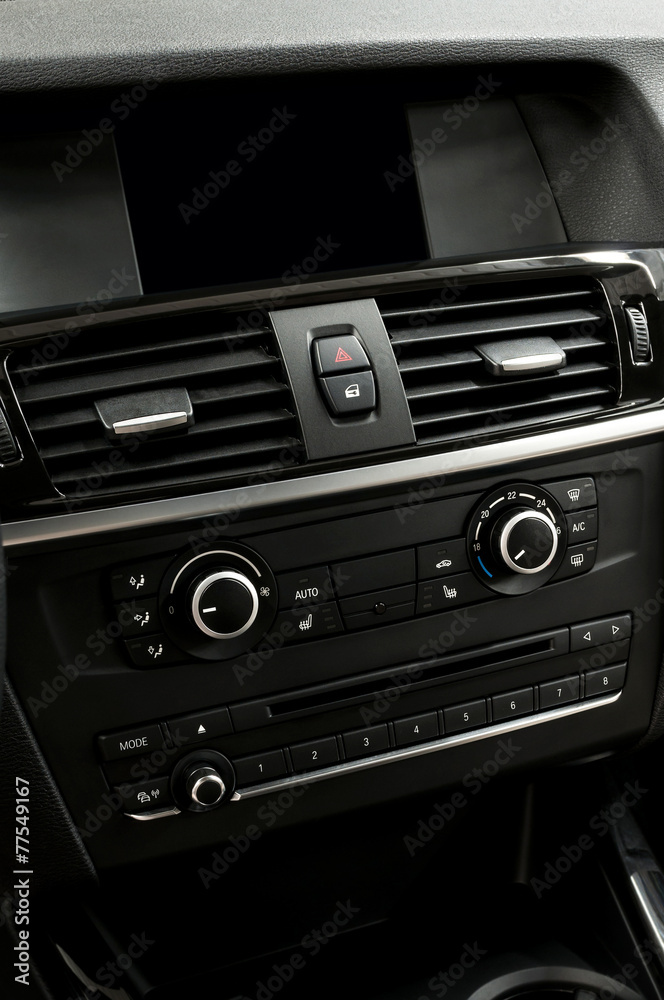 Car dashboard. Interior detail. Vertical photo.