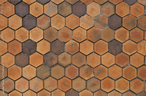 yellow hexagonal clay tile wall background, honeycomb tile abstr