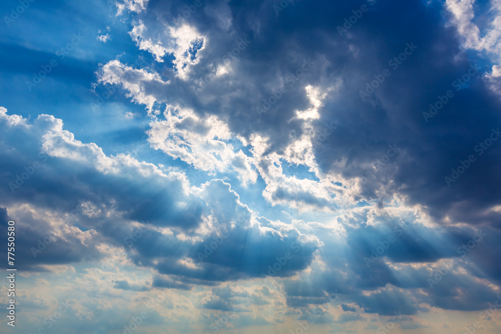 Dramatic cloudy sky clouds with real sun beams Dramatic cloudy sky clouds with real sun beams