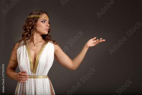 фотографія Classical Greek Goddess in Tunic Showing Something
