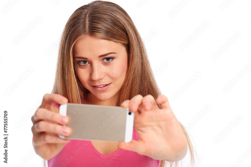 Young woman photographing