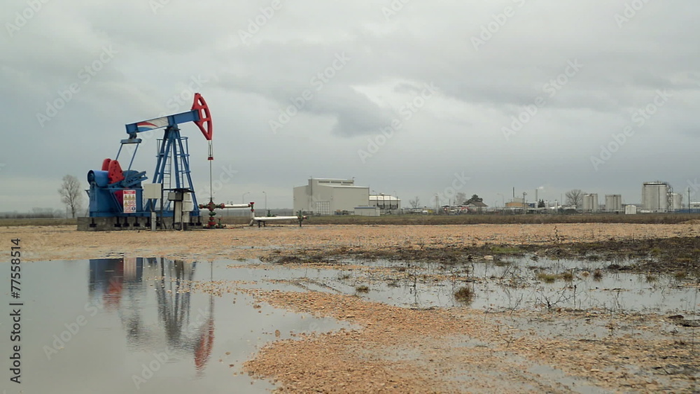 Pumpjack Oil Pump operating on natural gas in the oil field Pumpjack Oil Pump operating on natural gas in the oil field