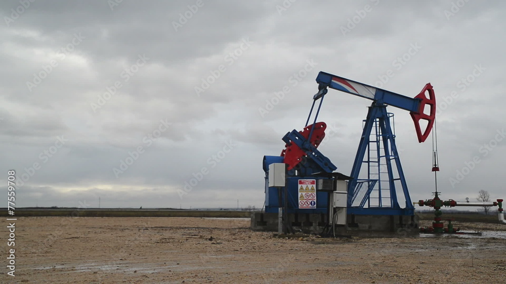 Pumpjack Oil Pump operating on natural gas in the oil field Pumpjack Oil Pump operating on natural gas in the oil field