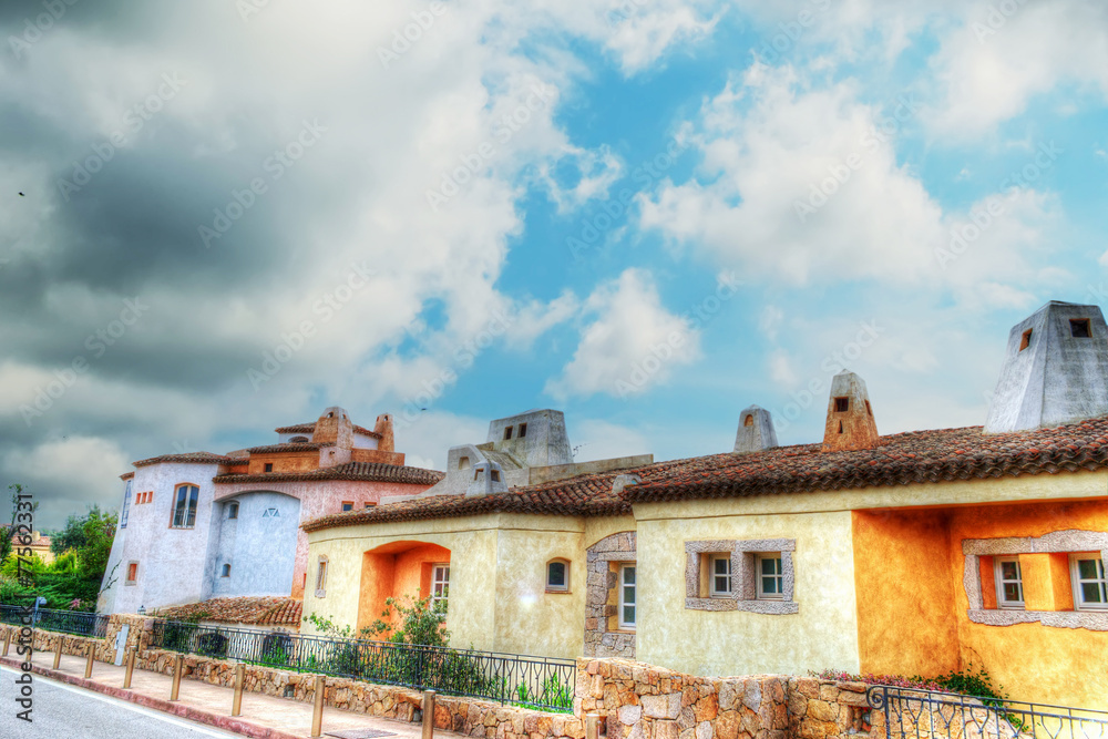 Porto Cervo buildings under a dramatic sky in hdr