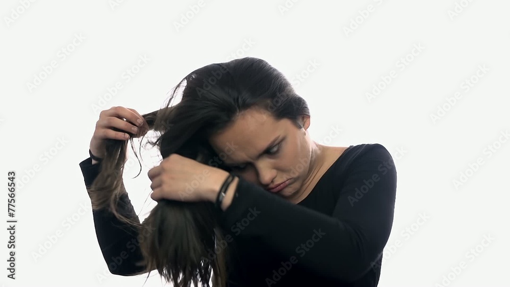 Woman worried over hair on white background
