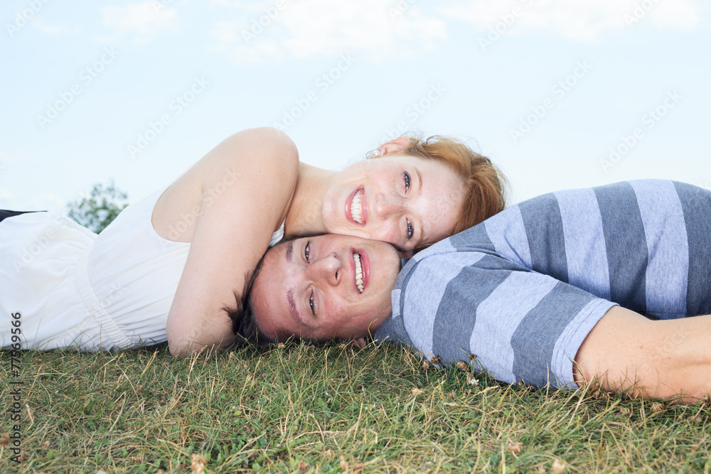 A couple outside having fun together outside A couple outside having fun together outside