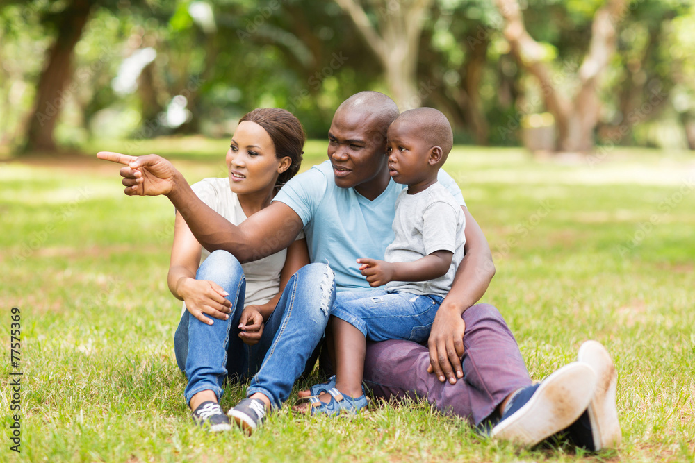 african family sitting in the park