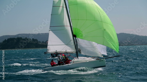 PORTOROSE - APR 07: Sailboats racing through the sea. Sailing competition in Slovenia, Portorose in 2013. photo