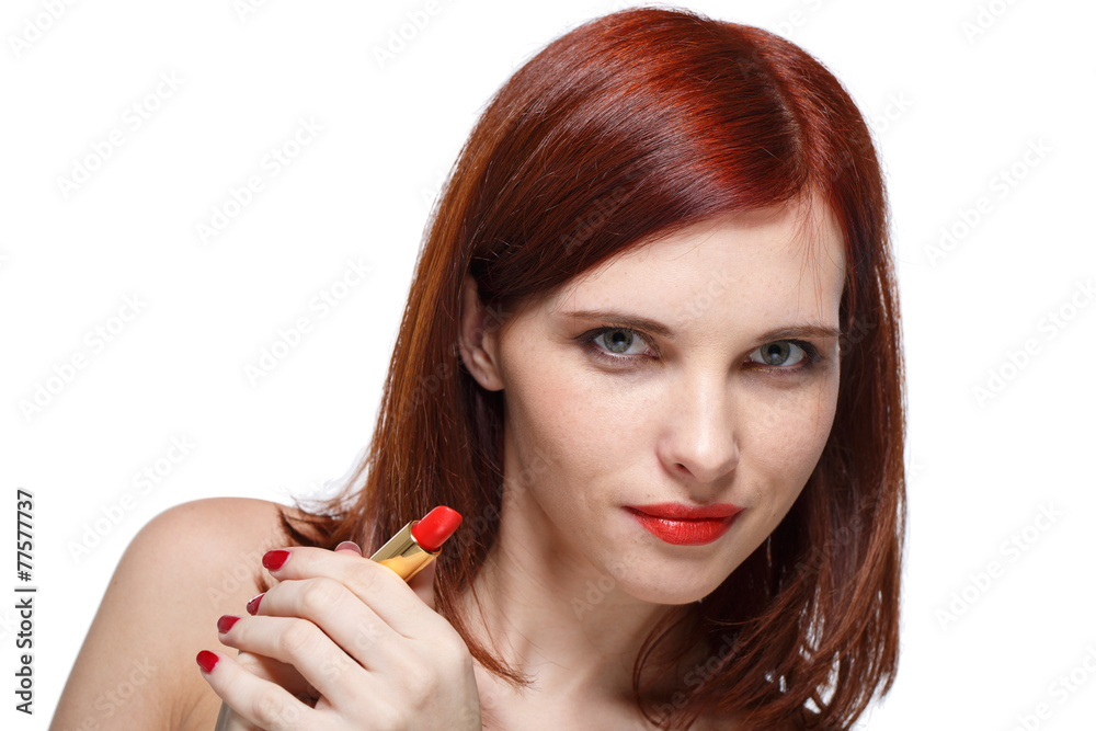 Fototapeta premium Woman applying lipstick for lips.