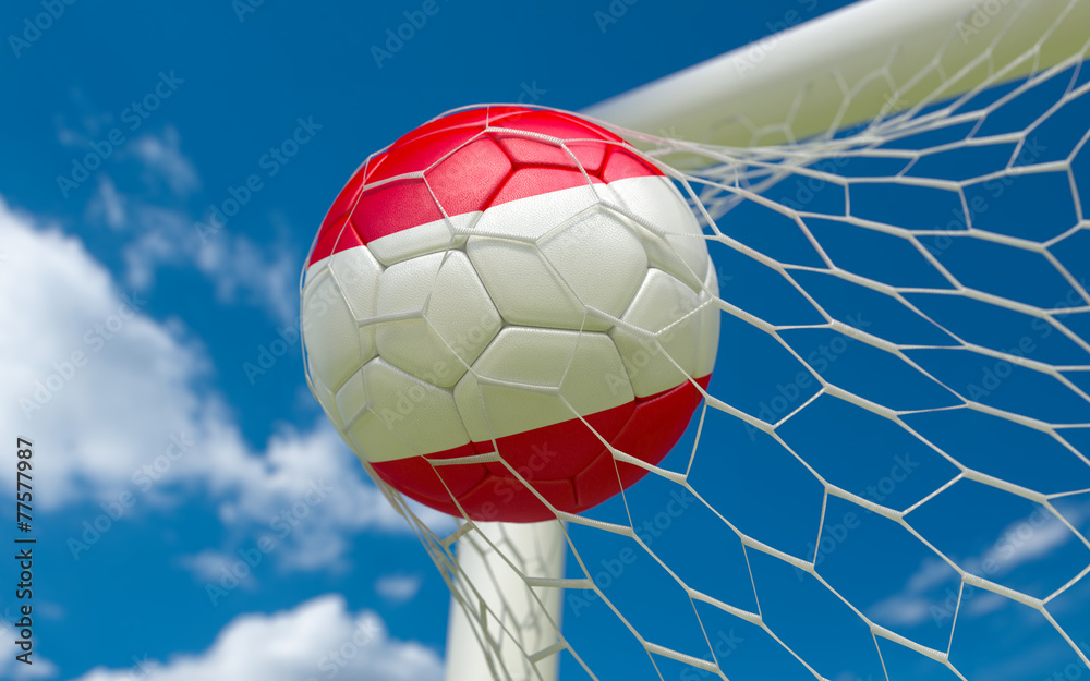 Naklejka premium Austria waving flag and soccer ball in goal net