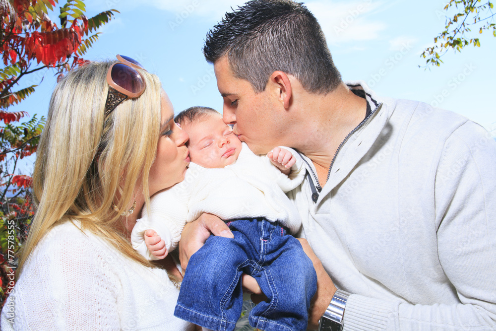 Fototapeta premium A Happy family having fun outdoors in autumn