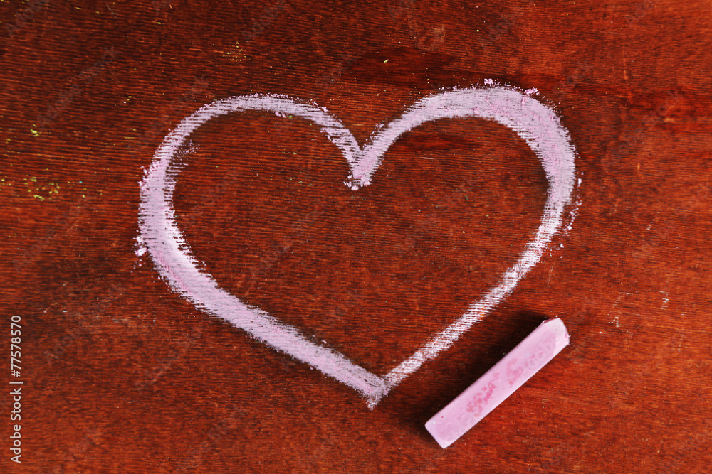 Heart drawn of chalk on wooden background close-up Heart drawn of chalk on wooden background close-up