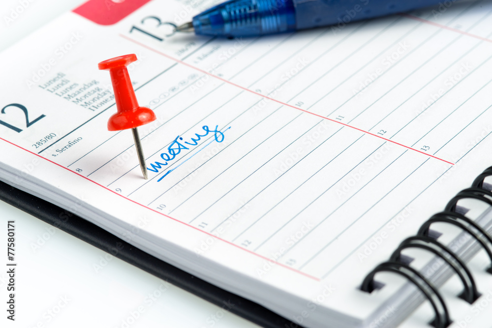 meeting appointment written on a weekly agenda meeting appointment written on a weekly agenda