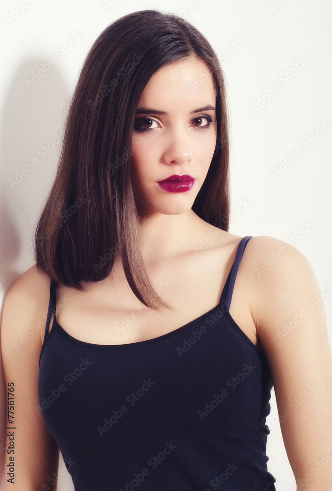 Portrait of the beautiful girl with long brown hair Portrait of the beautiful girl with long brown hair