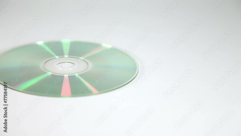Shot of a womans leg in high heels steping on cd Shot of a womans leg in high heels steping on cd