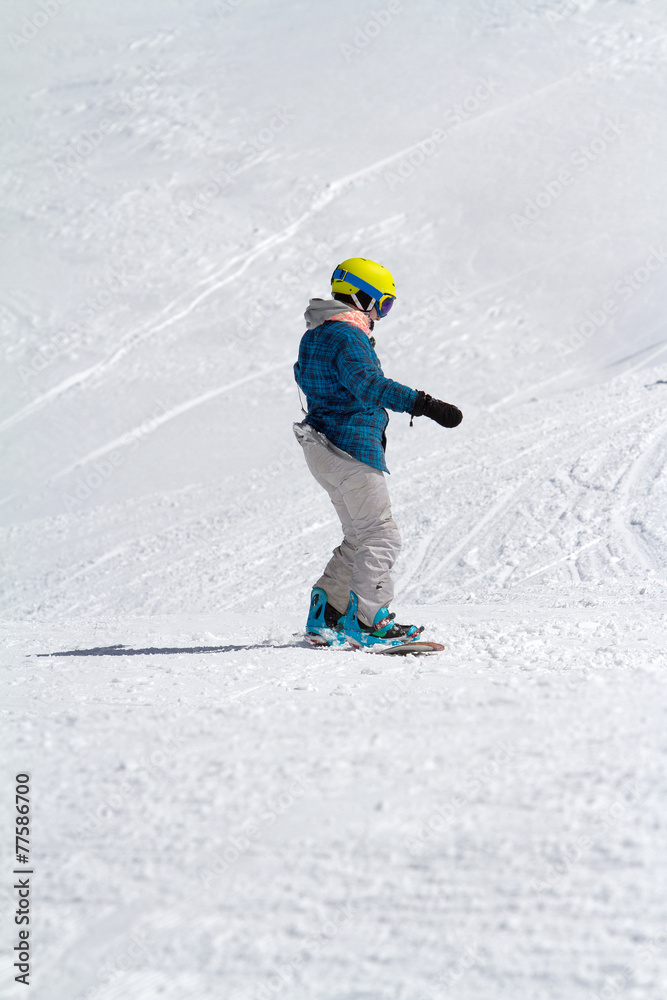 Snowboarder on the mountain slope