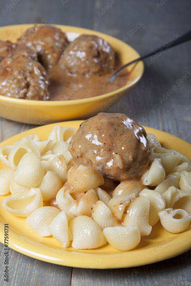 Meatballs with pasta with tomato sauce . Meatballs with pasta with tomato sauce .