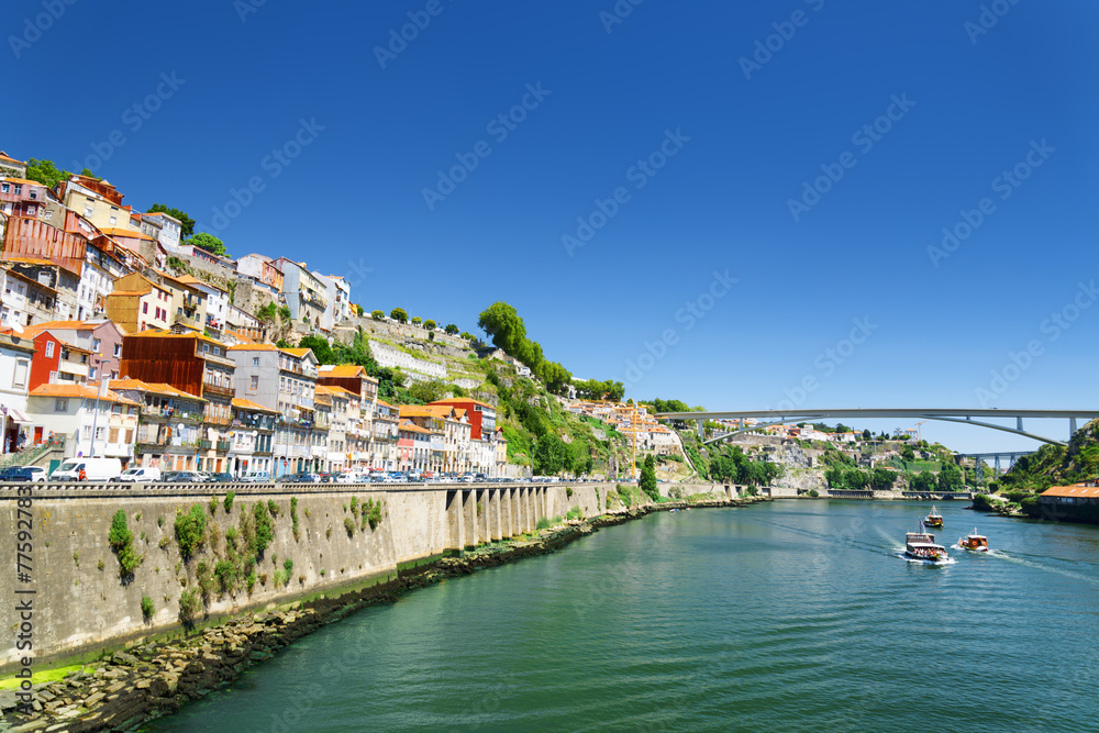 Colorful facades of old houses on embankment of the Douro River