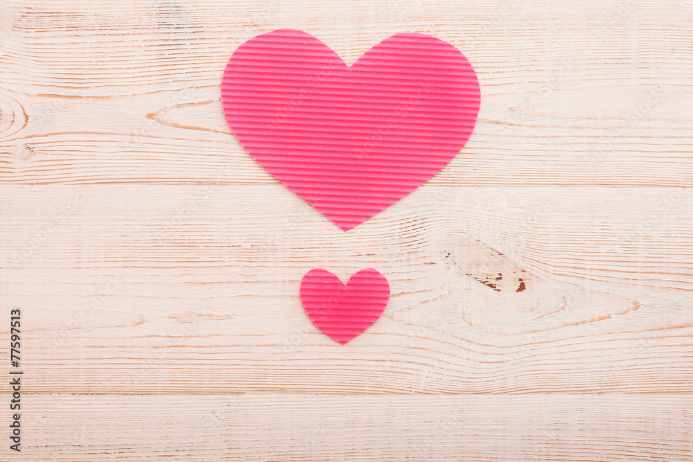 Hearts from paper. Valentines day. Wooden background